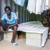 Der er temmelig mørkt inde i containeren, men især i regntiden er den bedre end teltene - foto: William Vest-Lillesøe